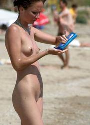 A nude babe at the Cap d'Agde Image 6