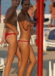 A busty bikini bitch undressing on the Hanauma Image 4