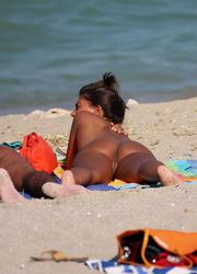 A bikini babe going topless on the Negril Image 4