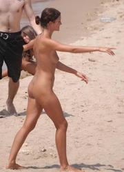 A busty bikini bitch undressing on the Natadola Image 11