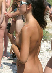 A nude teen girl posing at the Euronat Image 4