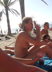 A bikini lady going topless on the Tambaba Image 8