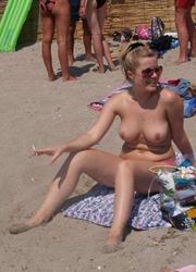 A nude teen girl posing at the Nugal Image 7