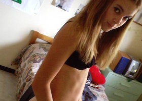 My new girlfriend is posing in her black lingerie for me. Image 7