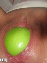 A green lime in her strange tight vagina
