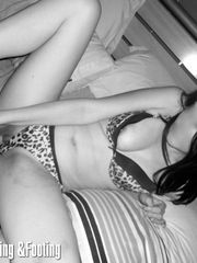Leopard panties in black-and-white sex scene
