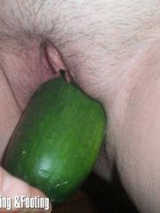 Her pussy is gobbling a cucumber
